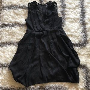 Black cocktail dress with lace details